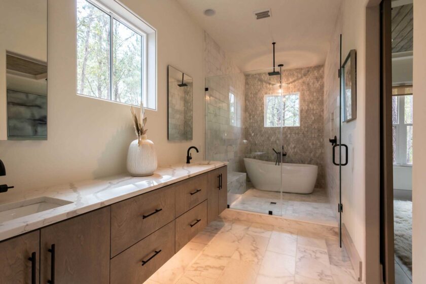 Bathroom with soaking tub in shower
